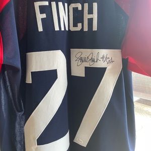 2004 Olympic gold star Jennie Finch signed authentic Jersey.